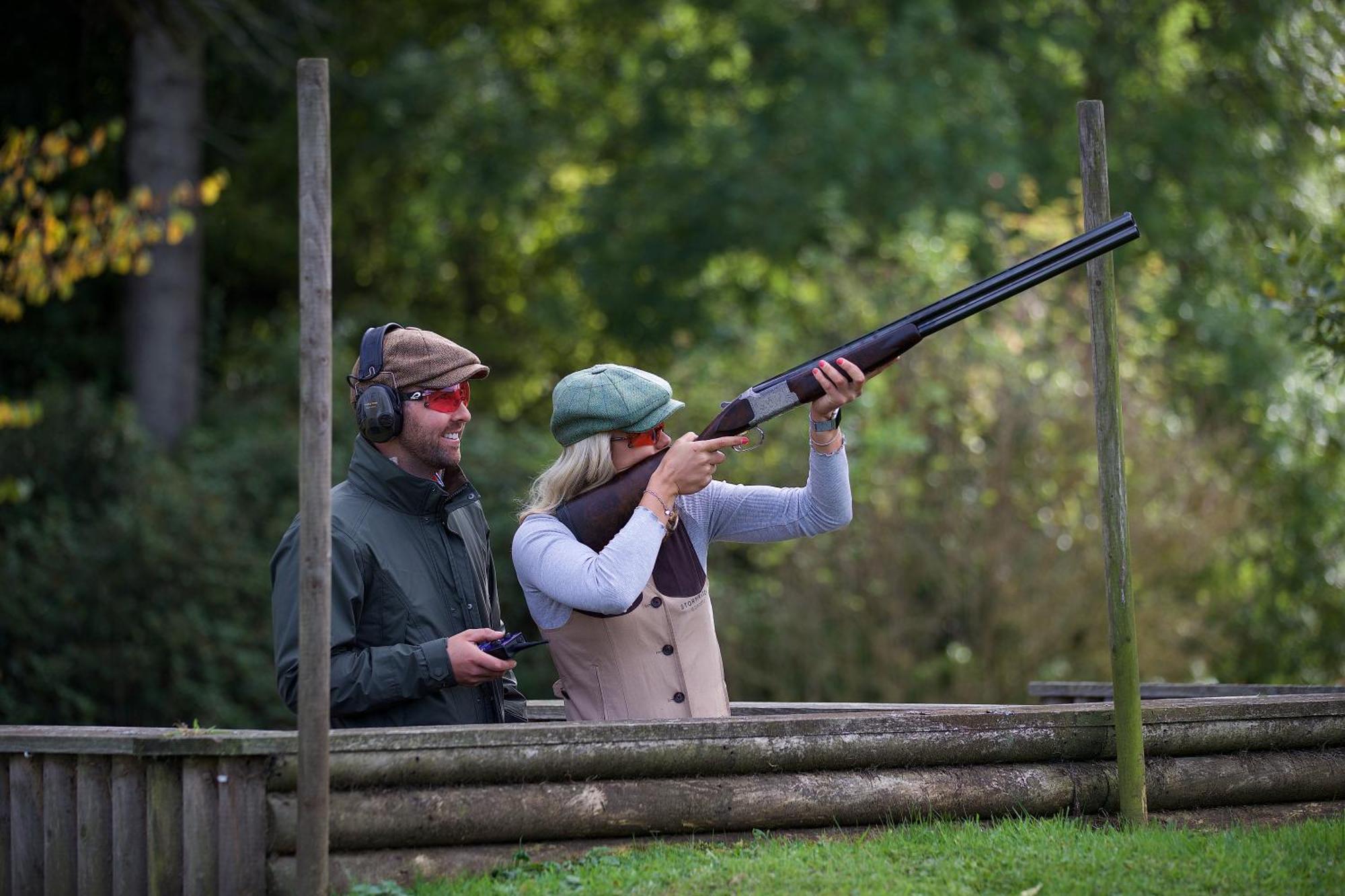 Schloss Roxburghe, Part Of Destination By Hyatt Exteriör bild A woman shooting with a shotgun