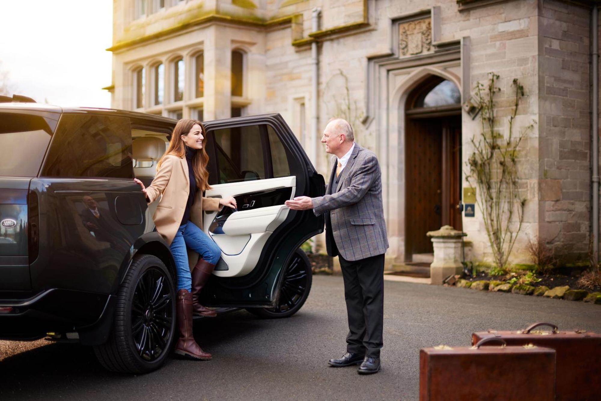 Schloss Roxburghe, Part Of Destination By Hyatt Exteriör bild A chauffeur opening the car door for a passenger