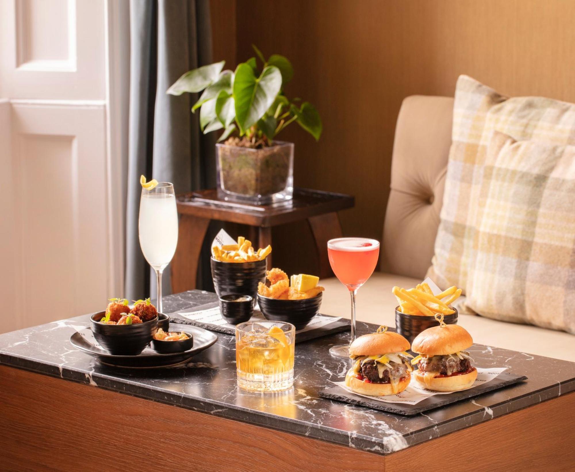 Schloss Roxburghe, Part Of Destination By Hyatt Exteriör bild A selection of cocktails and bar snacks at the bar