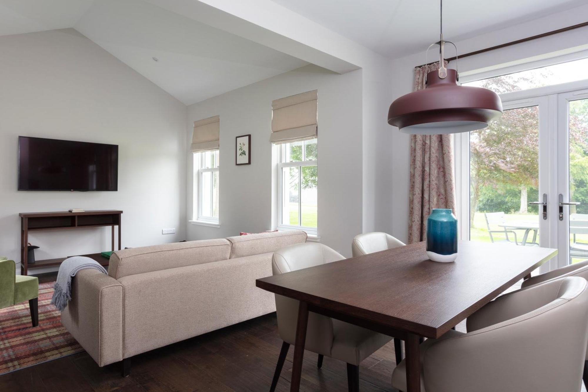 Schloss Roxburghe, Part Of Destination By Hyatt Exteriör bild A living room with a sofa and a table